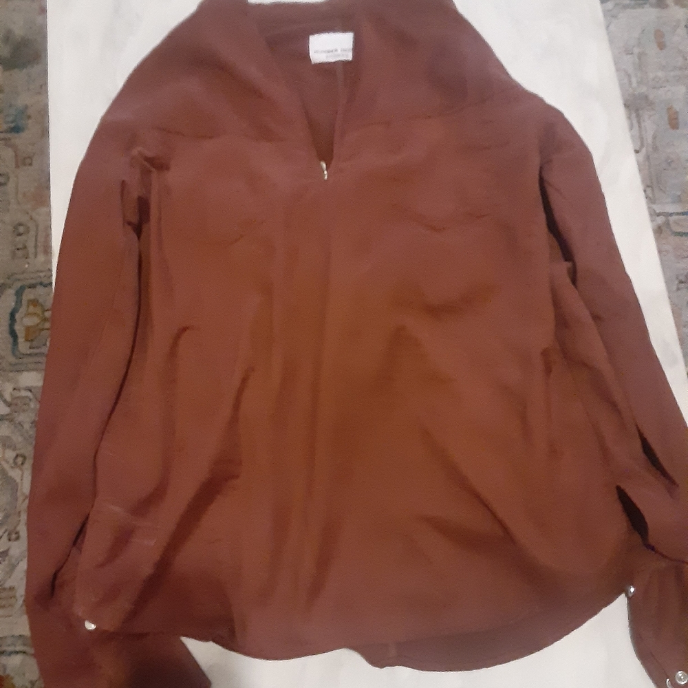 A Number Nine shirt. Brown in color size 3.